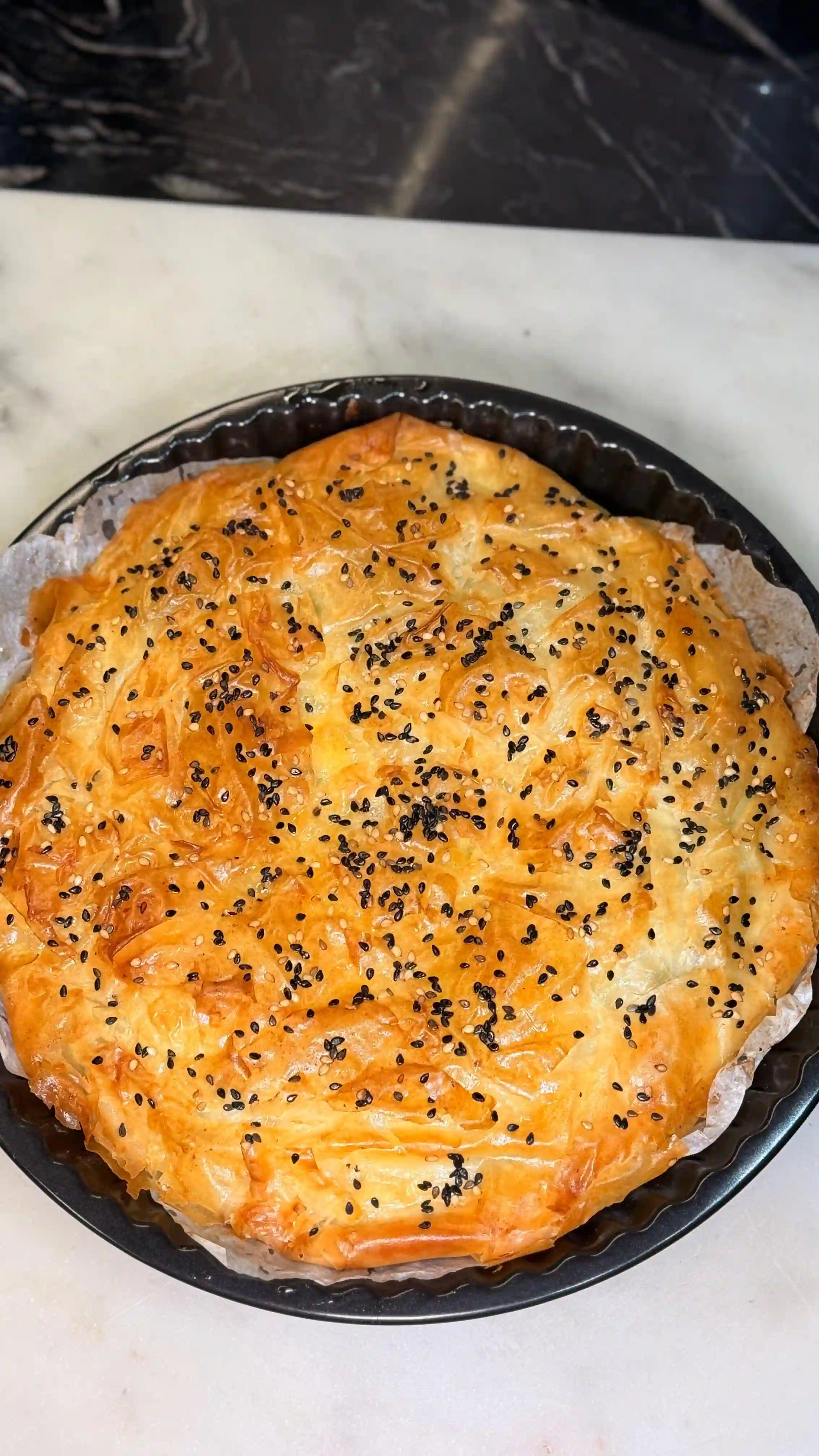 Crispy Phyllo Pie with Feta, Mozzarella, Fresh Herbs, and Sun-Dried Tomatoes